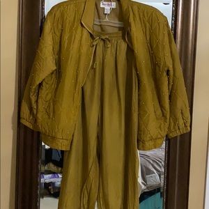 A lightly used silk gold and brown jogging suit.